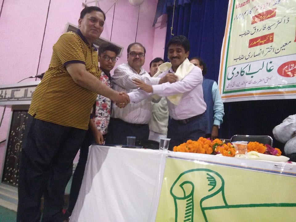 Ahmad Ali Barqi Azmi Along With Sarfaraz Ahmed Founder Bazm e Faraz e Adab Welcoming Mr. Ashfaque Ahmad Arfi.jpg